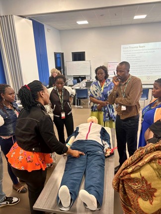 Simulation with Doreen Katushabe during the Trauma Nursing Fundamentals course in Butaro, Rwanda, March 2025