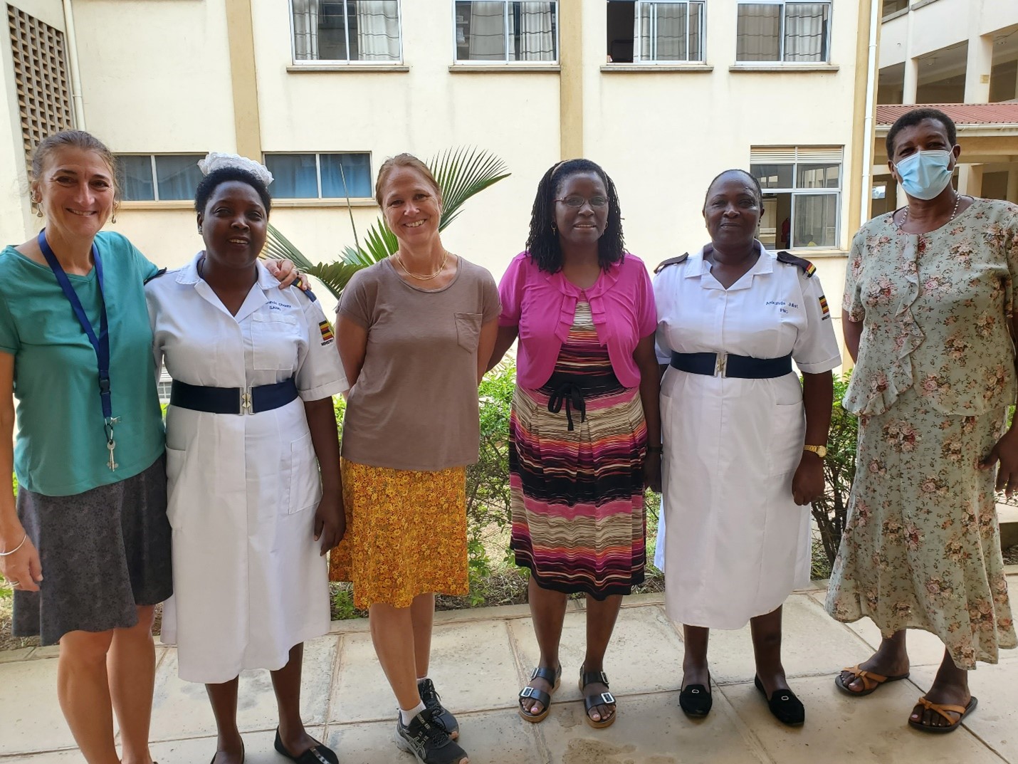 Mary Sebert with Nurse Fellows Jennifer Samiotes, and Clara Gona with Mbarara Regional Referral Hospital Nurse Leaders Charity Kwarikunda, Juliet Ankunda and Medal Gasunumi, July 2024.