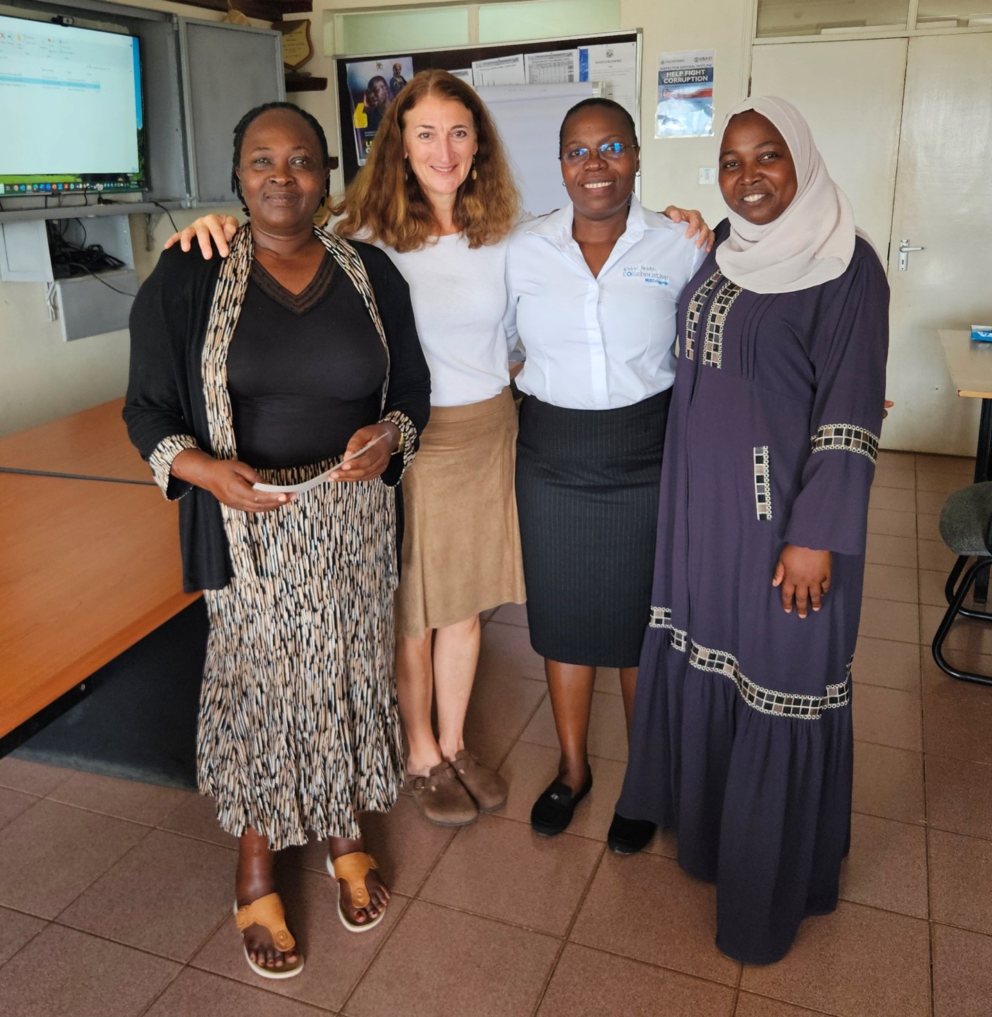 Juliet Ankunda, Senior Principal Nursing Officer at Mbarara Regional Referral Hospital, is with Mary Sebert, Annet Kembabazi, and Hanifah Nantongo following the Nursing Leadership training conducted for in-charge nurse leaders.