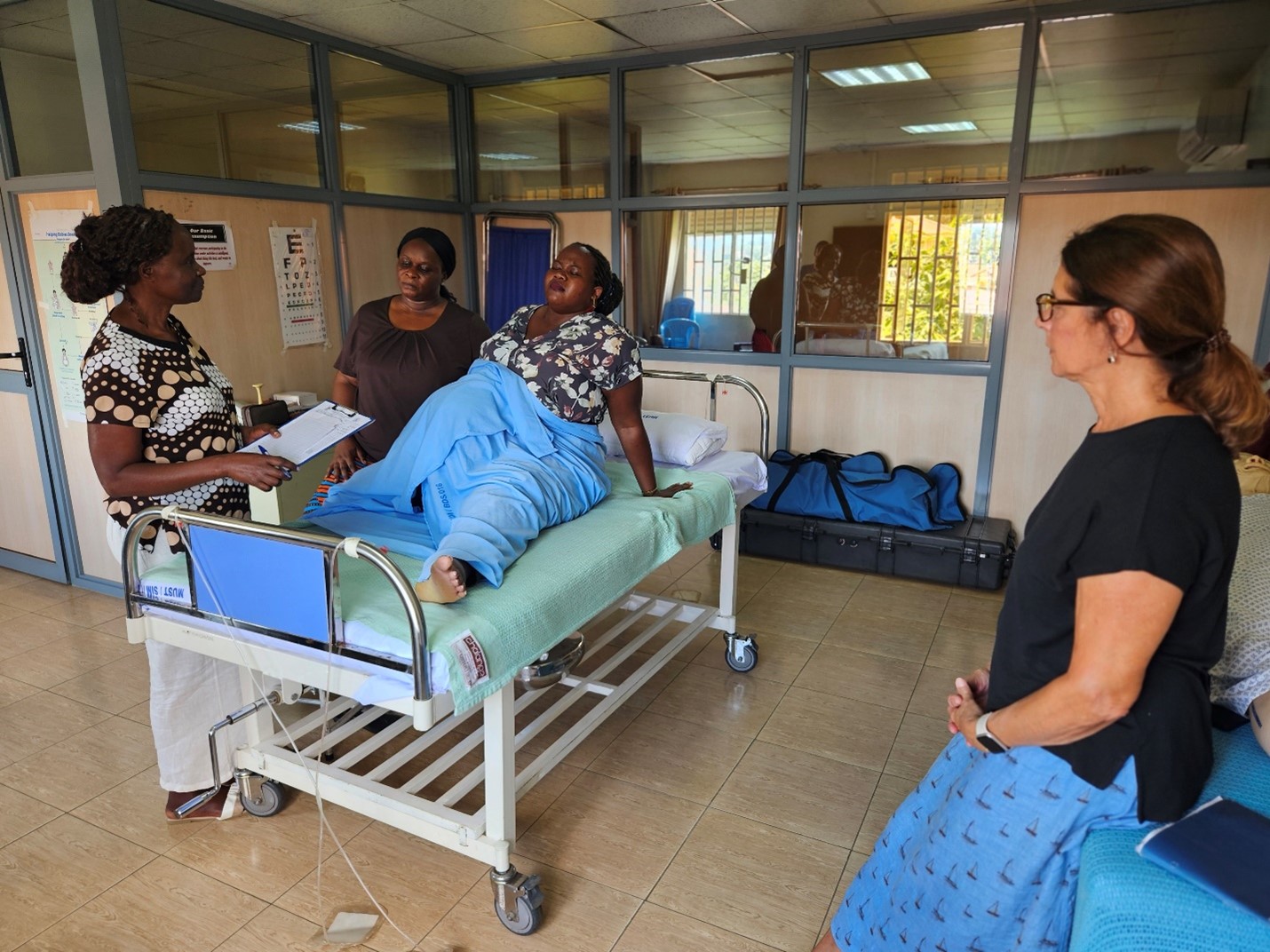 Master of Science Midwifery students from Mbarara University of Science and Technology participating in a simulation session facilitated by Nurse Fellow Bobbie Curtis in October 2024