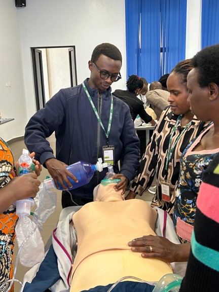 Participants in airway skills practice station during the Trauma Nursing Fundamentals course at the University of Global Health Equity, March 2025